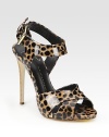 Patent leather style in a lavish leopard print with an adjustable slingback strap. Stacked heel, 4½ (115mm)Patent leather upperLeather lining and solePadded insoleMade in Italy