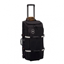 This wheeled Victorinox duffel bag boasts a top zip compartment to keep accessories separate from clothing, dual side pockets with hook-and-loop closures, and an external strap system to keep contents secure. Sturdy rear corner guards and TPE plastic kick plates protect vulnerable areas. One-touch dual trolley handle system. YKK Racquet Coil zippers provide superior strength.