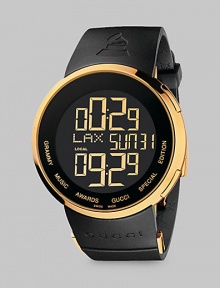 Breaking new ground in design, the GRAMMY® special edition watch collection uniquely fuses fashion and music. A bold timepiece of yellow goldtone PVD, with graphic digital numbers, on a thick rubber strap featuring GRAMMY® and Gucci logos.Swiss digital Water resistant to 3 ATM Round PVD case, 44mm, (1.73) Black dial Digital date display Anti-reflective coating Black rubber strap Three blades deployment buckle Made in Switzerland