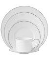 Wedgwood substitutes texture for tone in the exquisite Intaglio Platinum place settings. White bone china embossed with intricate geometric patterns is undeniably modern but inspired by Georgian-era designs.