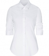 Both classic and cool with a flattering modern tailored fit, Steffen Schrauts white smoke sleeve shirt is a chic choice packed with wearing possibilities - Classic collar, ruched 3/4 sleeves with stitched cuffs, button-down front, shirttail hemline - Tailored fit - Wear with bright flats, slim-fit separates and a carryall tote to work