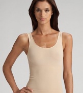 Sleek and seamless shapewear tank in an elasticized knit that instantly smooths and slims your torso. Control fabric helps smooth and slim Pull-on style Nylon/elastene/cotton Hand wash Imported