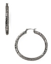 On-trend in textured metal. Slip on this pair of MARC BY MARC JACOBS hoop earrings to tip the style scales.