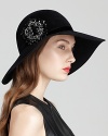 Top off your look with elegance in Kathy Jeanne's velour floppy hat, adorned with a removable black-crystal pin.