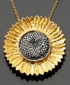 Celebrate light and life with this beautiful sunflower pendant featuring black diamond accents set in 14k gold over sterling silver. Approximate length: 18 inches. Approximate drop: 1-1/4 inches.