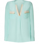 With an effortless chic look in pristine silk, Steffen Schrauts pastel detailed top is perfect for both dressing up and down - Open round neckline, long sleeves, buttoned cuffs, side slits, flap chest pockets, two-tone trim - Loosely fitted - Wear with skinnies, flats and a leather carryall