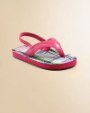 Her feet will be comfy and cozy in these thong sandals with plaid insole and rear elasticized ankle strap for easy on and off.Rear elasticized ankle strapSlip-onSportbuck upperCotton liningRubber solePadded insoleImported