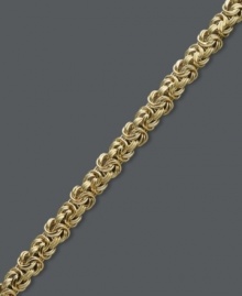 Luxurious links. This simple chain bracelet adds shimmer and shine. Crafted in 14k gold with a small Byzantine link. Approximate length: 7-1/2 inches.