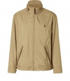 Sporty windbreaker in fine, tan synthetic fiber - A stylish spin on a modern classic from Ralph Lauren - Durable, lightweight material - Small, stand-up collar with zipper embellishment - Long, snap cuff sleeves, slash pockets and full zipper closure - Embroidered polo pony at chest - Slimmer, straight cut - Casually cool and ultra versatile, great for everyday - Pair with jeans, chinos or dressier trousers