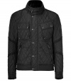 With its lighter weight and cool moto styling, Belstaffs quilted jacket is a sleek choice for transitioning into the new season in style - Belted stand-up collar, long sleeves, snapped cuffs, hidden front zip with snap panel, zippered slit and snapped patch pockets, belted sides - Contemporary straight fit - Wear with jeans and shearling lined boots