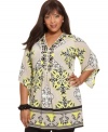 Punch up your casual style with Alfani's three-quarter sleeve plus size tunic top, finished by a beaded neckline and spirited print. (Clearance)