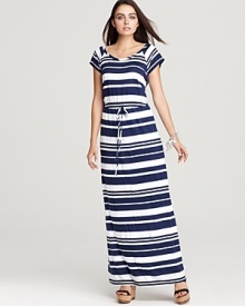 Navy stripes lend a breezy nautical feel to this Splendid maxi dress, finished with a drawstring waist.