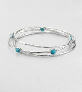 From the Rock Candy® Collection. A trio of hammered, sterling silver bangles accented with colorful, faceted turquoise. Sterling silverTurquoiseDiameter, about 2.5Slip-on styleImported 