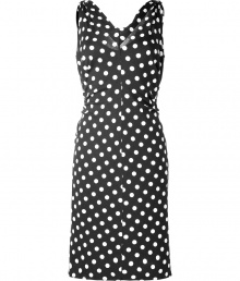 Stylish dress in a fine, black and white rayon-cotton blend - Fashionable polka dots - The dress is feminine, slim fit, falls soft, comfortable and flatters the figure - With a deep V-neckline, sleeveless - Pleasant mid-thigh length - Terribly versatile, suitable for the office and a cocktail party - Wear with pumps, peep toes, booties