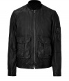 Luxe jacket in supple black leather - Rugged motorcycle silhouette with small stand up collar - Two flap pockets, one small zip pocket at left arm - Zips at front - Modern, skinny silhouette, hits at hip - A sleek and versatile go-to in any wardrobe - Pair with slim jeans or trousers, a cashmere pullover and trainers