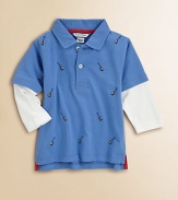 Your young rocker can add a touch of prep to his wardrobe with this smooth jersey polo with layered-look long sleeves, embroidered with tiny guitars.Polo collarShort sleeves with layered-look long sleevesButton placketAllover embroidered guitarsLonger-in-back tennis tails with side split hemCottonMachine washImported Please note: Number of buttons may vary depending on size ordered. 