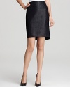 Infuse your 9-to-5 style with classic femininity in this Elie Tahari tweed skirt. Add interest to the sleek style with a ruffled blouse for a nod to this season's ladylike trend.