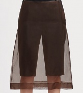 A perfect mix of roadster and romance, edgy biker shorts with a zip-on silk skirt.Waistband with belt loopsSide zip closureZip-on sheer skirt overlayShorts: rise, about 10; inseam, about 14Skirt: about 29 from natural waistViscose/silkDry cleanImportedModel shown is 5'10 (177cm) wearing US size 2. 