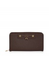 Add luxe style to the everyday with this leather zip wallet from Marc by Marc Jacobs - Classic rectangular shape, front logo with gold-tone hardware, zip around closure, internal zip pockets and space for credit cards - Perfect for daily use or as a thoughtful gift