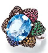 Floral perfection. This vibrant flower-shaped ring highlights a natural Swiss blue topaz center (8-1/2 ct. t.w.) surrounded by multicolored Swarovski zirconia petals (1-7/8 ct. t.w.). Set in sterling silver. Size 7.