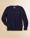 An essential crewneck sweater is rendered in cable-knit cotton for a timeless, preppy aesthetic.CrewneckLong sleeves with ribbed cuffsPullover styleCottonMachine washImported