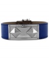 Sassy in sapphire. This leather snap bracelet from Vince Camuto has an edge to it. Featuring studs crafted from silver tone mixed metal and an ID plaque, it brings the right amount of attitude. Approximate length: 8 inches.