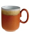 A rustic two-tone glaze and rounded base that's perfect for cupping ensure the Double Dip mug warms up decor and drinker alike. Oven- and microwave-safe stoneware makes it quick and easy to reheat hot cocoa, coffee or soup.