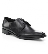 Square toe dress shoe with lace up front with top stitching detailing on front, rubber heel, slightly stacked.