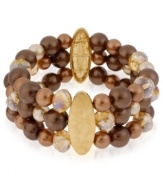 Quite a stretch. Kenneth Cole New York's stretch bracelet is crafted from gold-tone mixed metal with oval accents, as well as rows of brown glass pearls and beads for a stunning statement. Item comes packaged in a signature Kenneth Cole New York Gift Box. Approximate length: 7-1/2 inches. Approximate width: 1-1/5 inches.