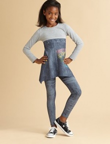 A solid bodice connects to a mock faded jean print skirt with a sequin-accented graphic and asymmetrical hem for a cute look.Crewneck Long sleeves Pullover style A-line silhouette Empire waist Inverted U-shaped hem 85% rayon/15% spandex Hand wash Additional InformationKid's Apparel Size Guide 