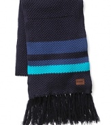 A chunky woven scarf with stripe trim and fringes at the ends.