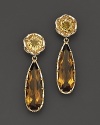 Faceted citrine rounds and cognac quartz pear drops set in 18K yellow gold and sterling silver.