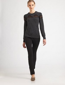 Refined and ultra-soft wool is embellished with lace cut-outs.CrewneckLong sleevesPullover styleVirgin woolDry cleanMade in Italy of imported fabric Model shown is 5'10 wearing US size 4. 