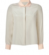 Modern and contemporary with chic tonal pastel coloring, NY born and raised designer Jonathan Simkhais sweet silk blouse is a fun choice for dressing up daytime looks - Blush collar and cuffs, long sleeves, button-down front, longer back - Loosely tailored fit - Wear with favorite skinnies and flats