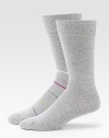 A pair of everyday socks, each woven with essential stretch ease. Includes one pair with stripes and one pair without.Pack of 2Mid-calf height73% cotton/23% polyamide/2% elastaneMachine washImported