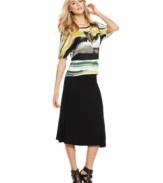 Trend-right, midi length meets fluid, a-line design on a closet-staple-chic skirt from Kensie.