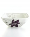 Hand-painted purple and white flowers sprawl across this serving bowl, giving your tabletop a contemporary garden vibe. In glazed earthenware, the Anna Plum set from the Laurie Gates collection of dinnerware and dishes is an easy way to spruce up your decor for small gatherings or quiet nights at home.