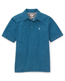 The classic polo is updated in a cotton slub with cool asymmetrical piecing along the shoulder and sides.