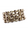 Four sure: We're certain you'll love wearing Charter Club's elegant four-row bracelet featuring simulated pearls in varying shades of brown. Made in gold tone mixed metal with a bar detail. Approximate diameter: 2 inches.