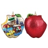 This glittering red apple ornament highlights famous New York City attractions. A perfect addition to your holiday tree, packed in its own black lacquered box.