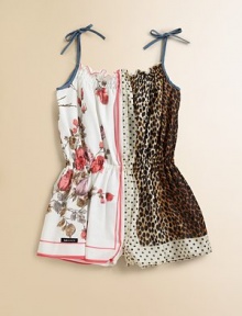 Bold leopard spots, pretty polka dots, feminine roses and durable denim all come together in a charming woven romper of cool cotton.Denim tie shoulder strapsSmocked ruffled necklineSleevelessElasticized pull-on waistDenim back patch pocketsCotton liningCottonMachine washImported