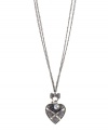 Crisscross chic. Baguette crystals form a distinctive pattern on Betsey Johnson's heart pendant necklace. Also adorned with glittering crystal accents, a glass pearl and a double chain design, it's made in hematite tone mixed metal. Approximate length: 32 inches + 3-inch extender. Approximate drop: 2-6/10 inches.