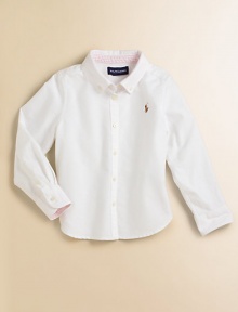 An all-season favorite and wardrobe essential in soft cotton oxford. Button-down collar Long sleeves with button barrel cuffs Button placket Embroidered polo pony logo Back yoke and box pleat Shirttail hem Cotton Machine wash Imported Please note: Number of buttons may vary depending on size ordered. 