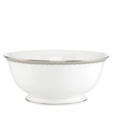 Inspired by the trim on an elegant gown, the graceful Lace Couture serving bowl features an intricate platinum border that combines harmoniously with white bone china for unparalleled style. By Lenox. Qualifies for Rebate