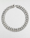 From the Cordelia Collection. Polished sterling silver in an undulating curb chain design.Sterling silver Length, about 18¾ Width, about 18mm Toggle closure Imported 