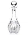 Dramatic cuts and a modern shape give this wine decanter a stunning flair. Topped by a beautiful crystal orb this decanter displays your fine wine in an equally fine setting. A wonderful gift for any oenophile.