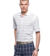 Stripe it up. This polo shirt from Izod has performance features that'll up your game instantly.