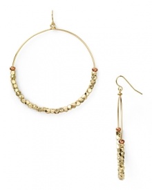 Work this season's exotic influences into your accessories collection with this pair of beaded hoop earrings from Vanessa Mooney, accented by an eclectic mix of golden nuggets.