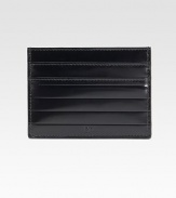 A slim-line case is elegantly crafted in pleated, mirrored leather. Four card slots4W X 3HMade in Italy