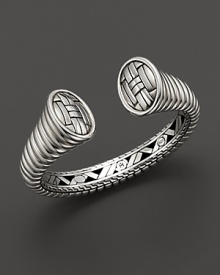 Basket-woven accents and inner detailing add complexity to this simply chic sterling silver bracelet.